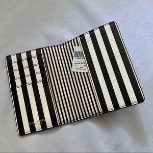 Henri Bendel centennial passport holder